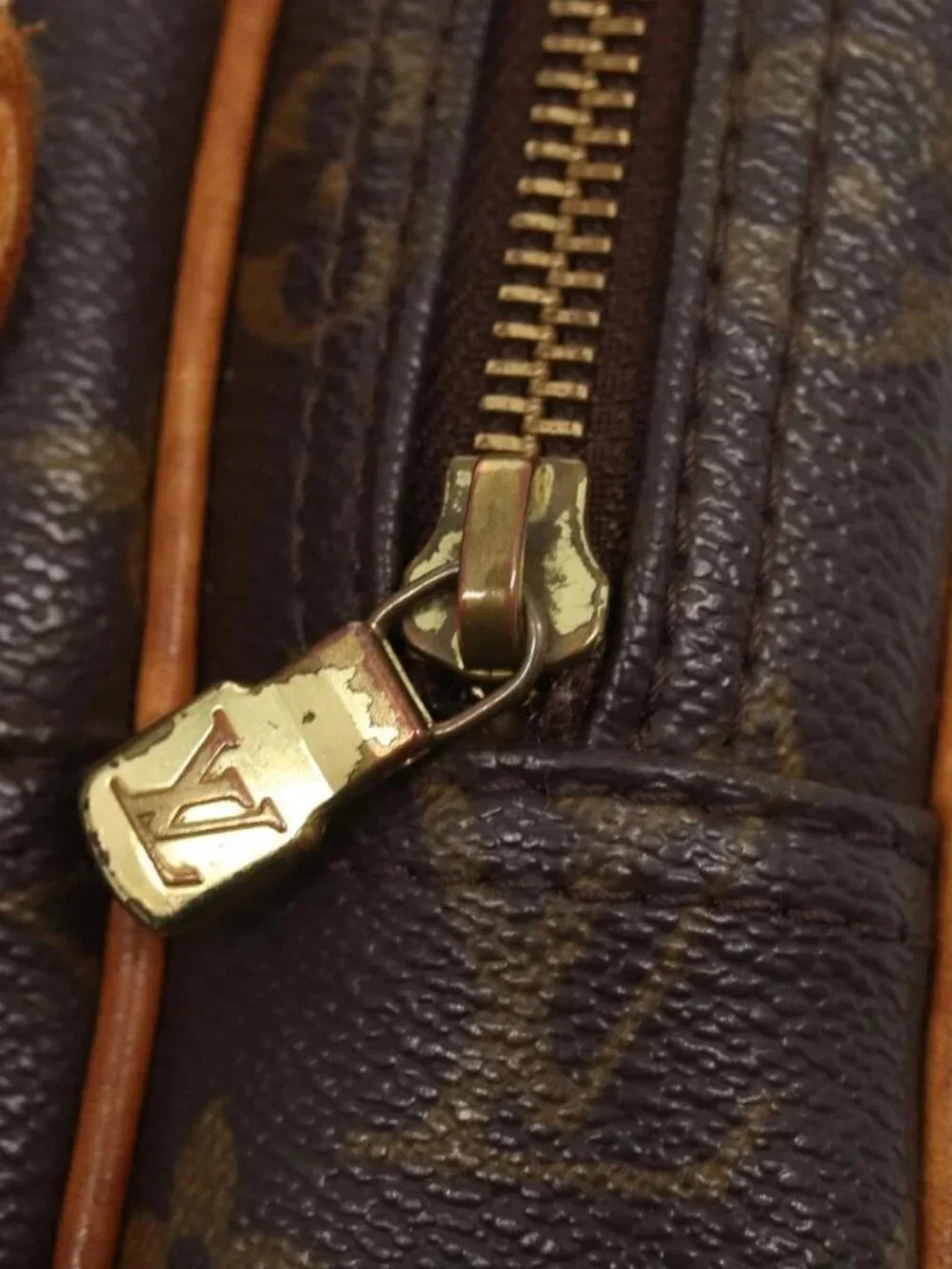 Louis Vuitton condition	 repaired